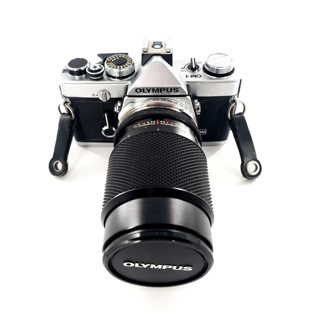 Olympus OM 1 35mm SLR Film Camera with 75-150mm Lens w/ Quantaray 135mm f/2.8